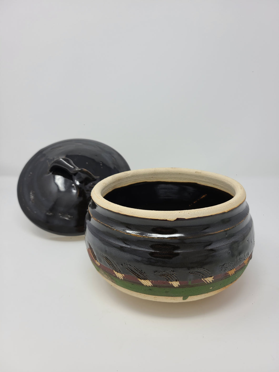 Dark Brown and Bare Clay Lidded Jar